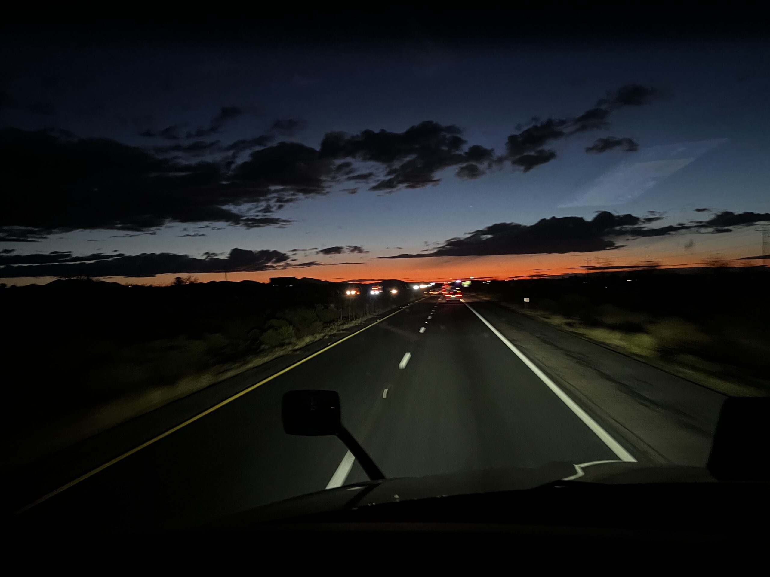 Sunset over the highway with desert clouds, I-10 in Benson, Arizona