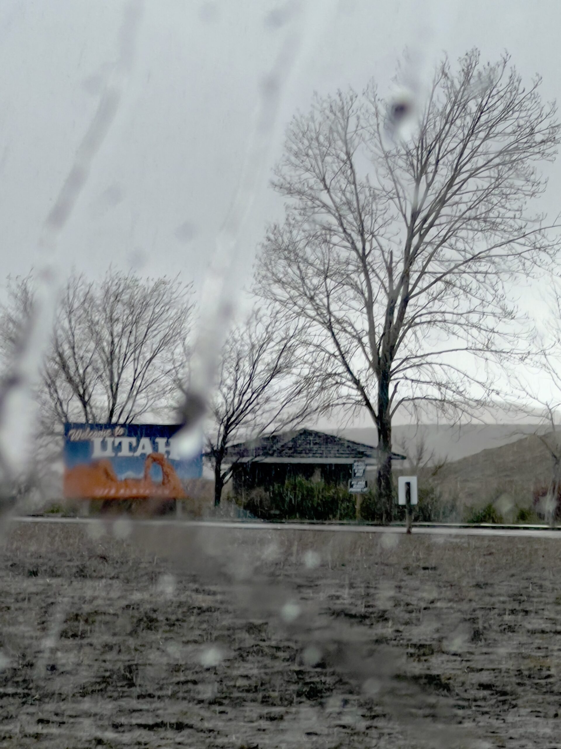 Welcome to Utah sign on a grey day on I-70 West in Thompson, Utah